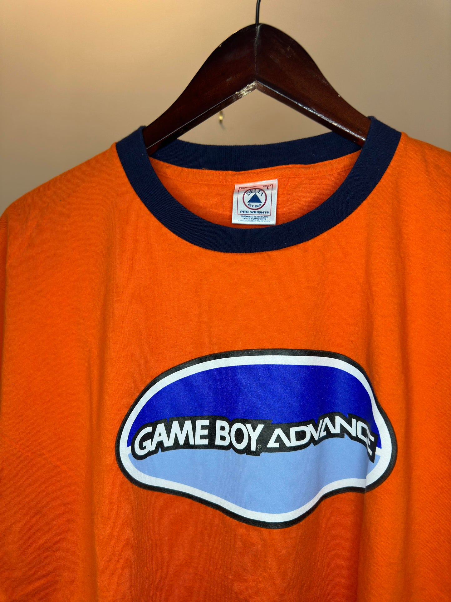 VTG x DELTA x Nintendo x Gameboy Advance Orange Graphic Ringer Tee - L